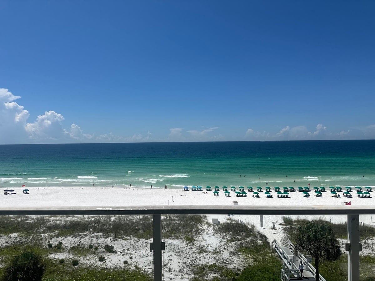 Emerald Coast beach view from a Destin, Florida condo balcony